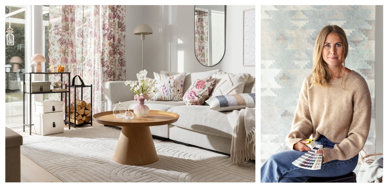 Olohuone, jossa on sohvaryhmä, sohvapöytä ja kukalliset verhot sekä Rustan sisustussuunnittelija värinäytteitä kädessä.