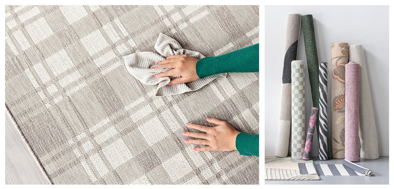 Hand wischt Teppich mit Tuch. Aufgerollte Teppiche lehnen an Wand.