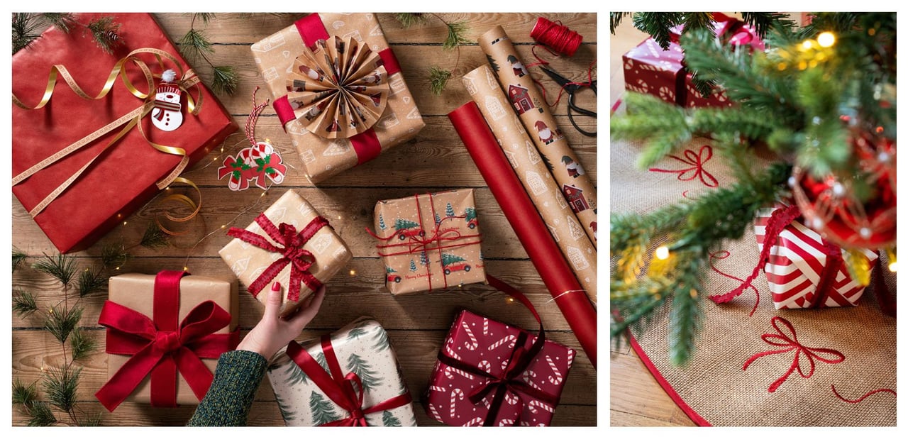 Inslagna julklappar och julpappersrullar i olika färger och mönster. Julklappar under julgran.