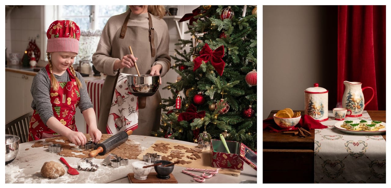 Lapsi ja aikuinen leipovat piparkakkuja joulukoristellussa keittiössä koristellun kuusen vieressä.