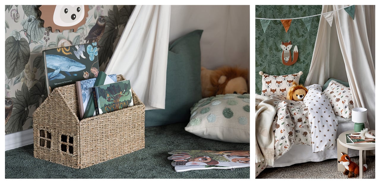 Barnrum med förvaringskorg i form av ett hus, bäddset med skogsdjur och sänghimmel.