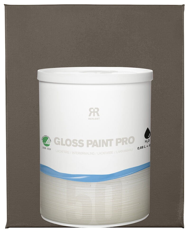 Valkoinen maalikannu harmaata taustaa vasten.