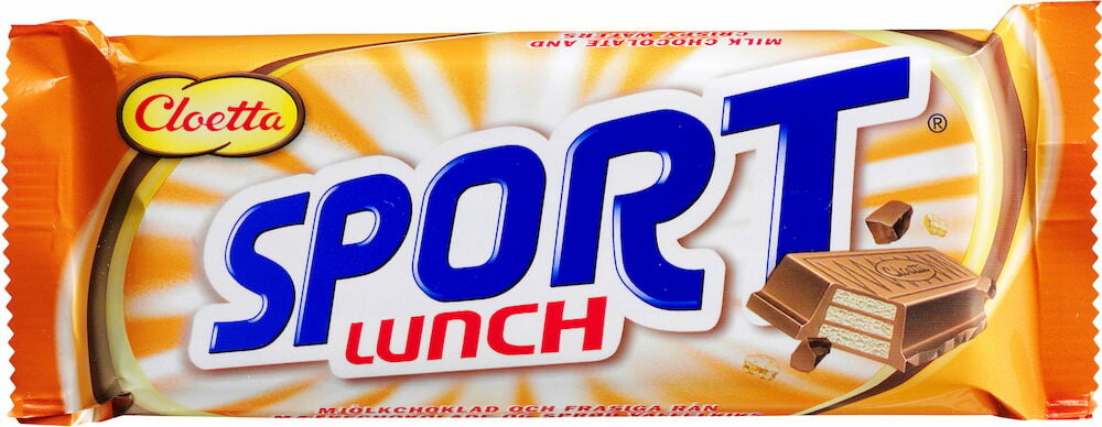 Choklad Sportlunch 80 g i orange förpackning med blå och röd text, visar en chokladkexbar.