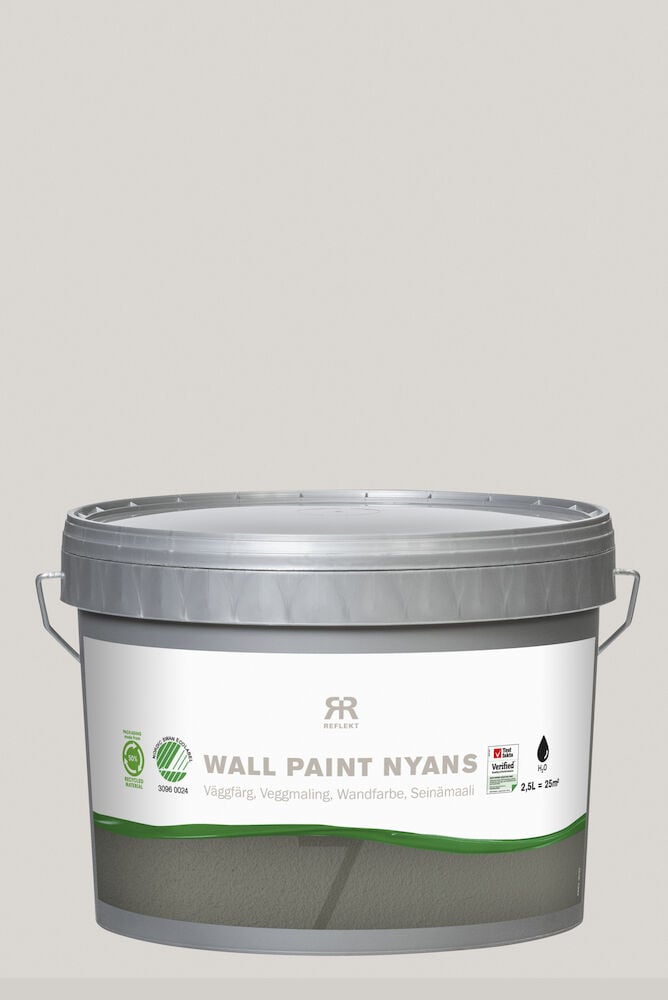 En grå färgburk med silverlock och etikett fram.