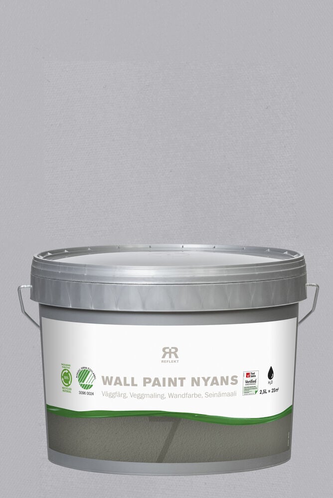 En hink väggfärg nyans balans mot grå bakgrund.
