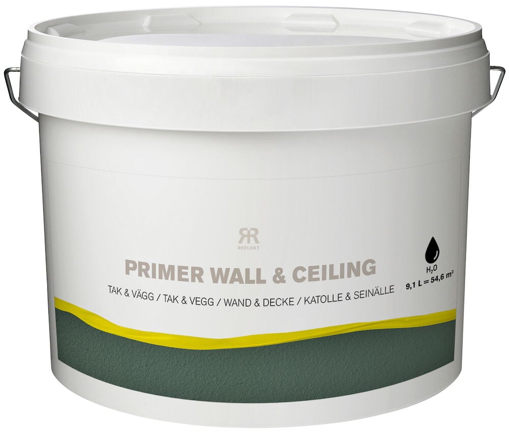 Vit plasthink med lock och etikett för primer.