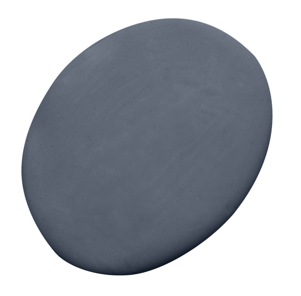 En rund droppe helmatt blå väggfärg.