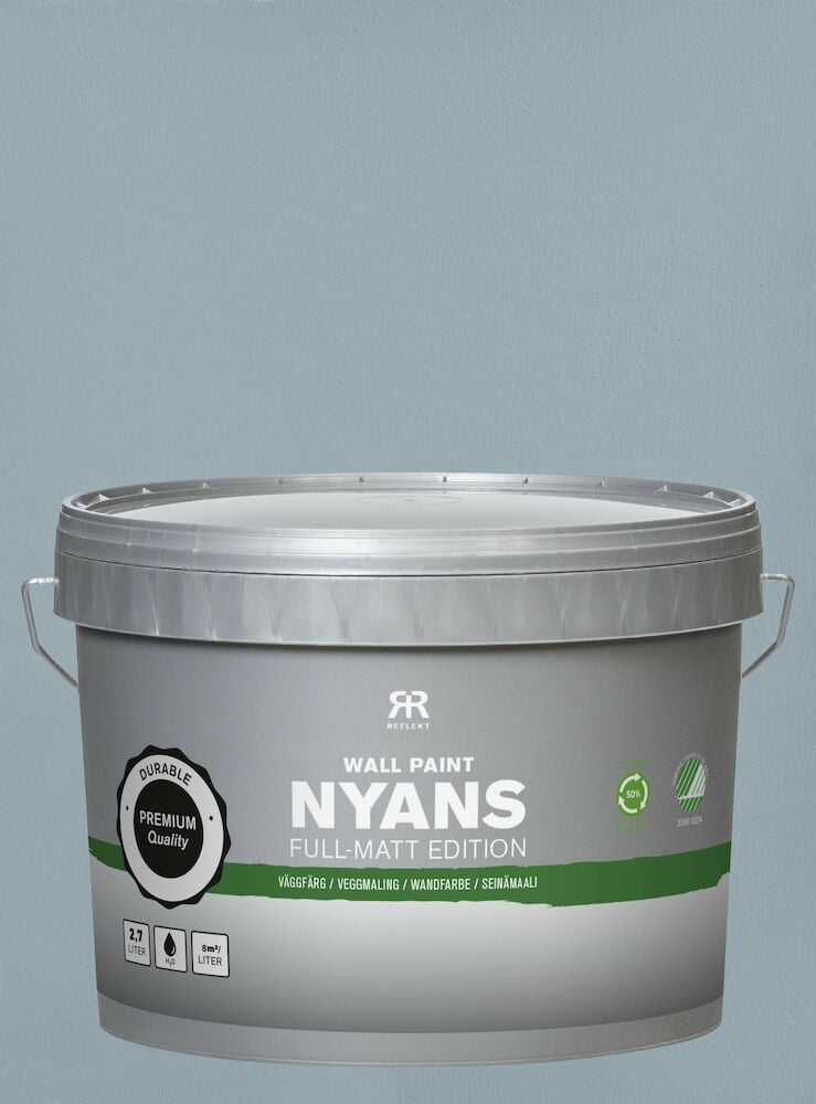 Grå färgburk med helmatt väggfärg, blå vägg.