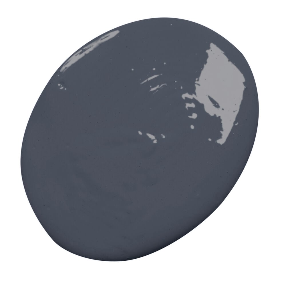 Mörkblå helmatt färgklick på vit bakgrund.