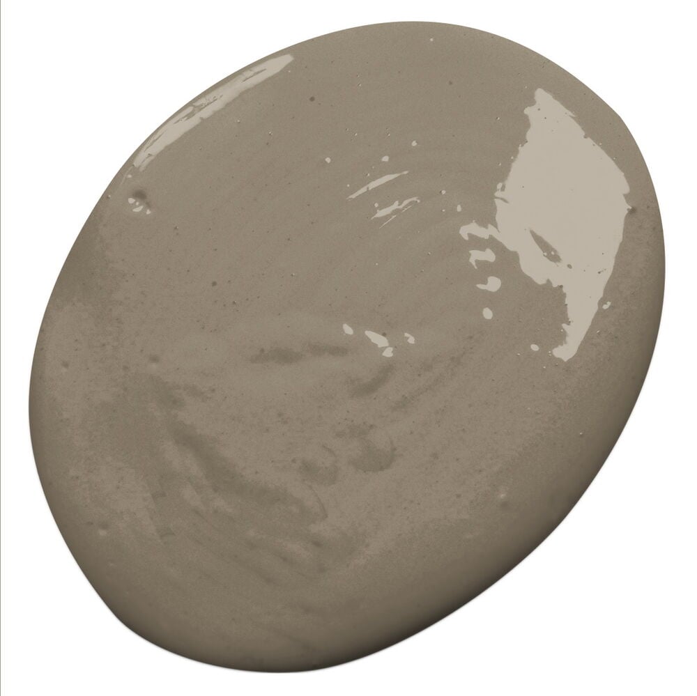 Ein Farbmuster von Nyans Calm Space Wandfarbe, ein helles Warmgrau.