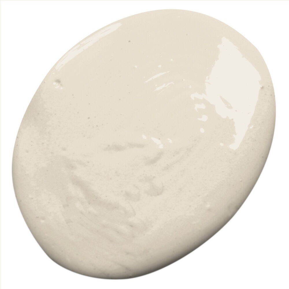 Kermainen vaalea beige Nyans Rich Creme seinämaali, 2,5 litraa, soikeana roiskeneena.