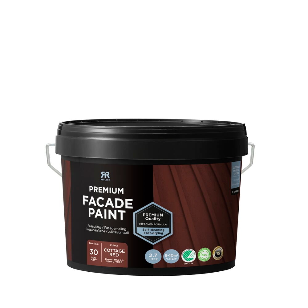 Svart färghink med etikett Cottage Red.