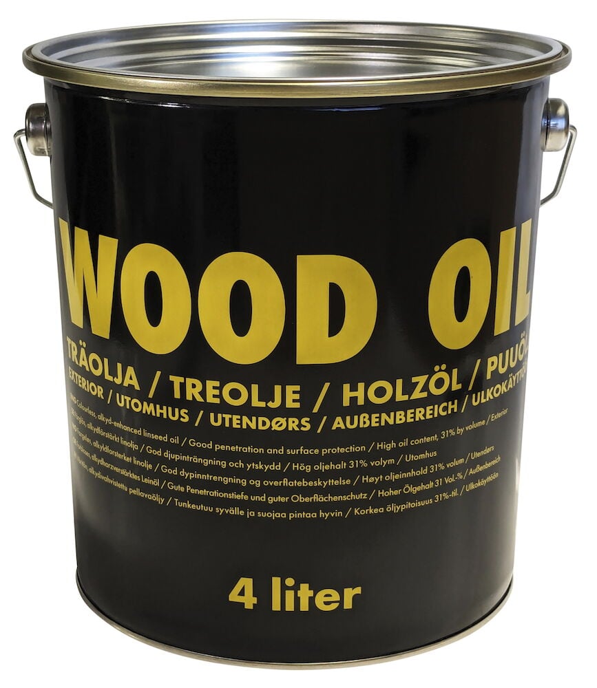 Svart plåthink med gul text, träolja fyra liter.