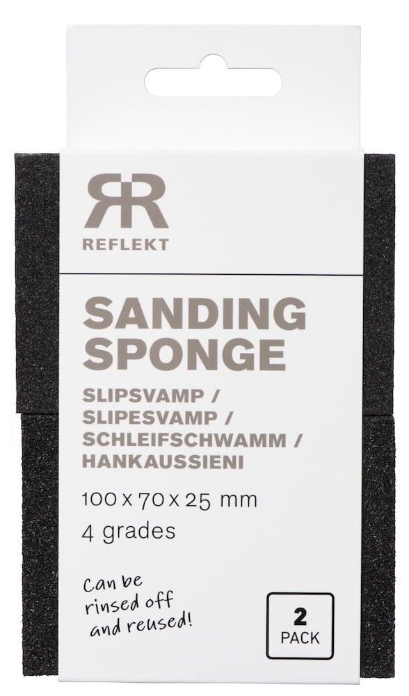 Två rektangulära svarta slipsvampar i förpackning.