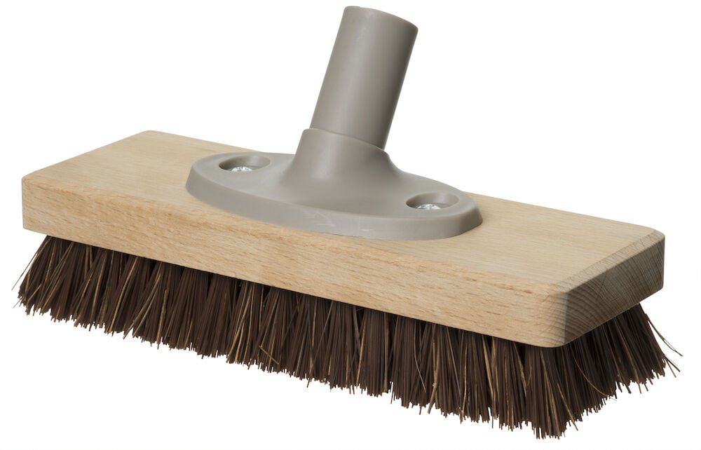 Skrubborste med plastfäste och styva borst.