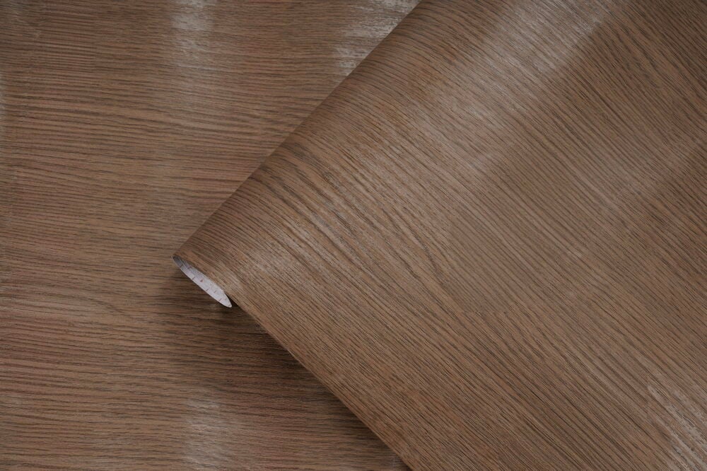 Brun dekorplast 200x67,5 cm med treåring delvis utrullet.