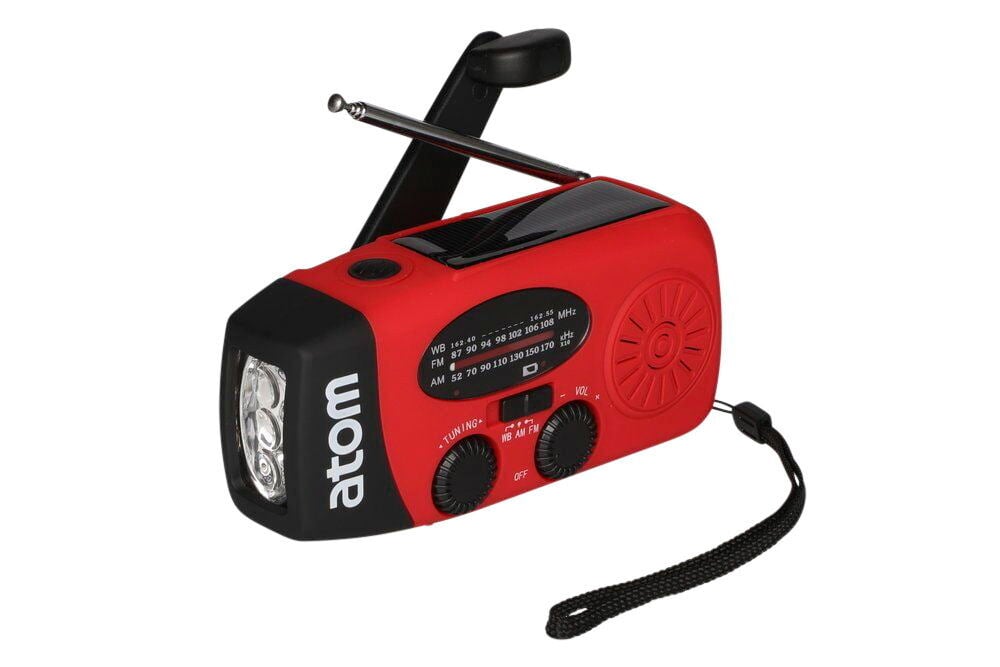 Punainen ja musta hätäradio kampeamilla ja LED-lampulla.