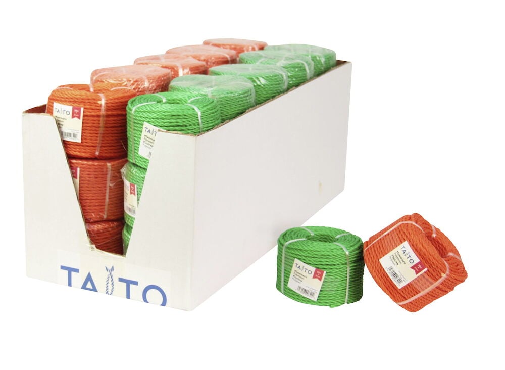 Useita keriä värillistä polyeteeninauhaa valkoisessa pahvilaatikossa.