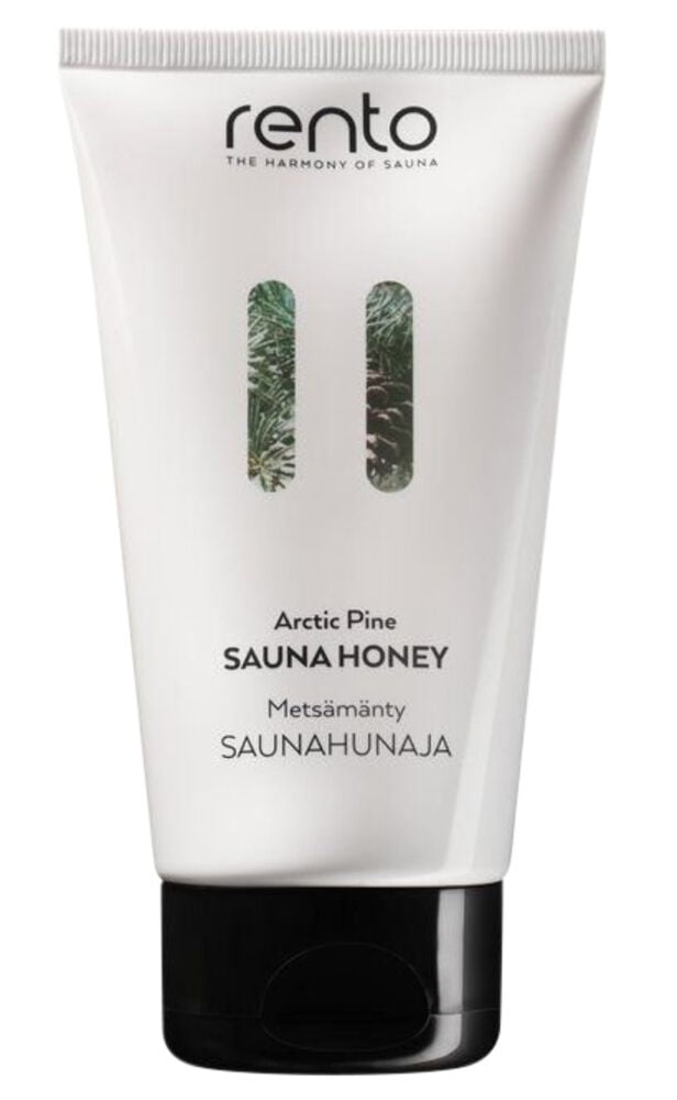 Valkoinen putki mustalla korkilla ja vihreällä koristeella.