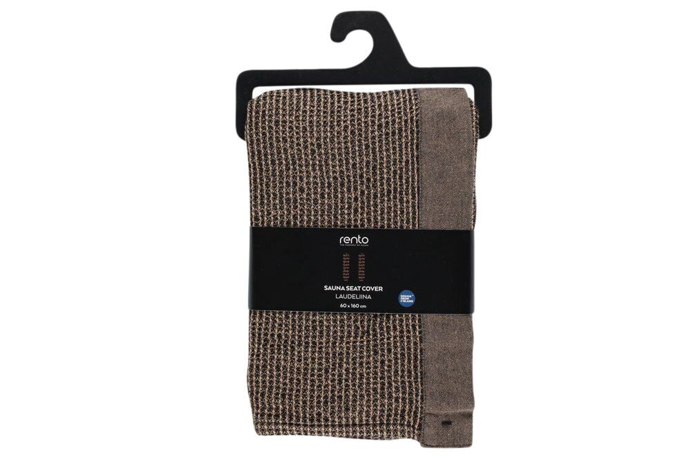 Musta ja beige saunapyyhe hengaritelineessä.