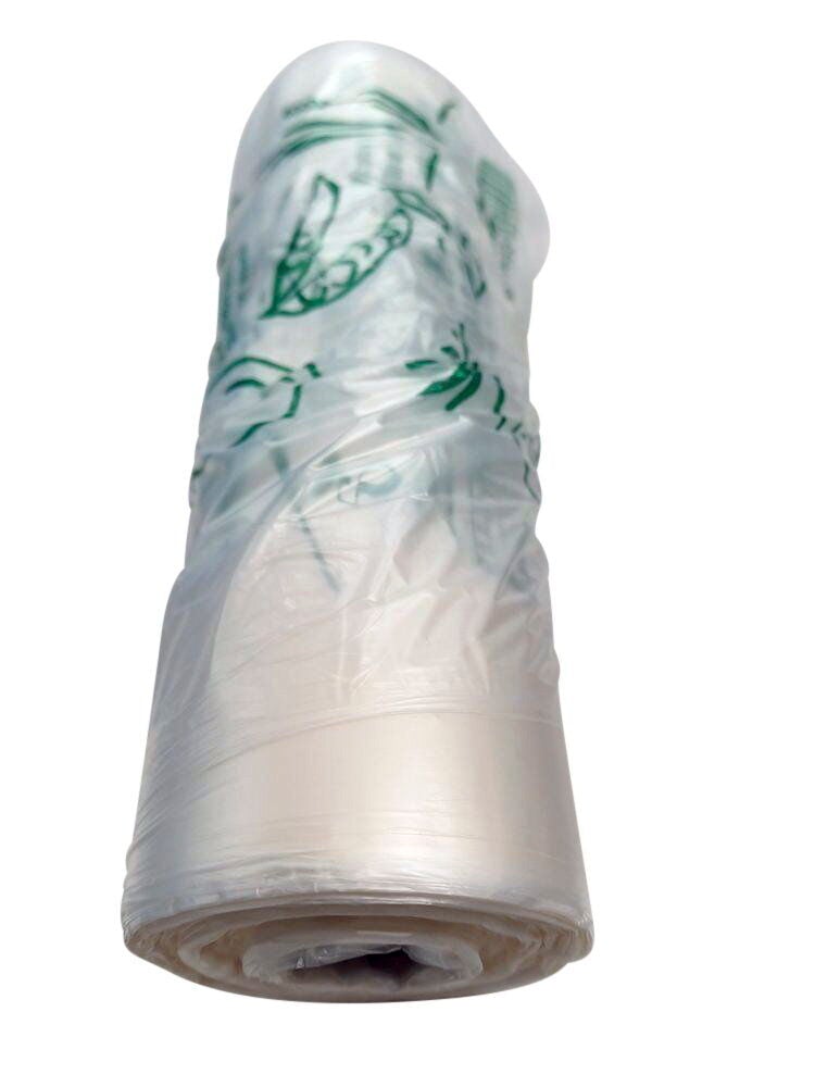 Rulla, jossa on läpinäkyviä kompostoituja pusseja ja vihreitä painatuksia.