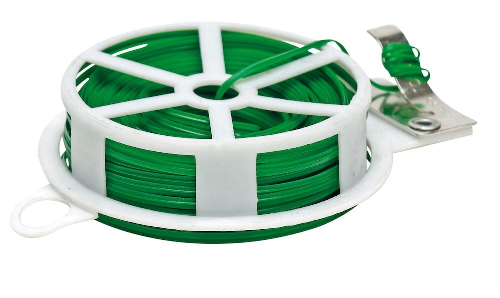 Vihreä lanka valkoisella kelalla pikaliittimellä.