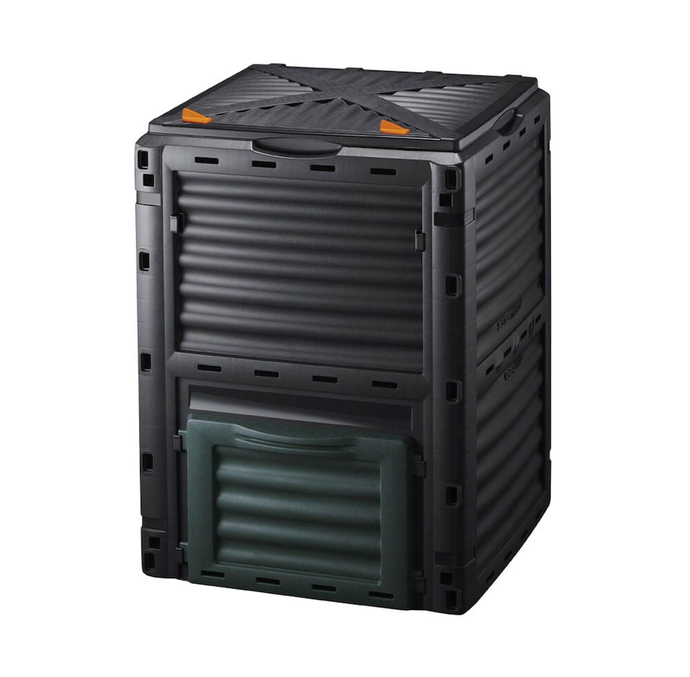 Musta kompostiastia, jossa on kansi ja vihreä tyhjennysluukku.