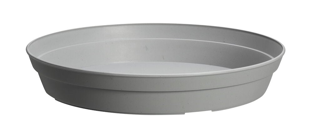 Harmaa viljelyastia korkeilla reunoilla muovia.