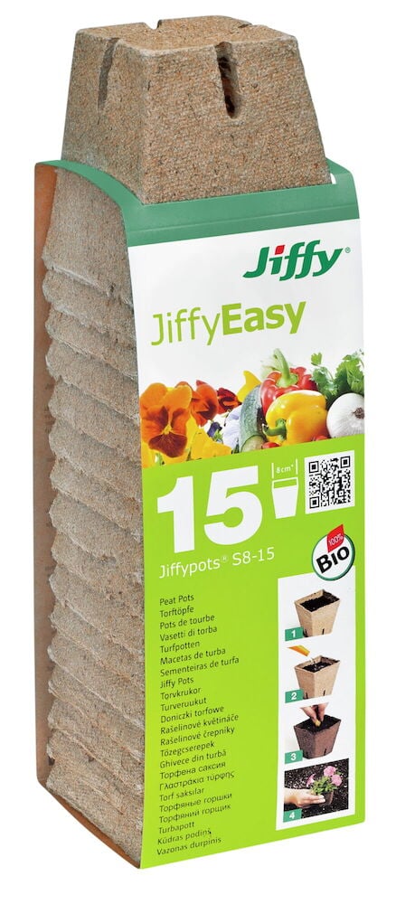 Viisitoista neliönmuotoista turveruukkua pinottu vihreällä etiketillä.