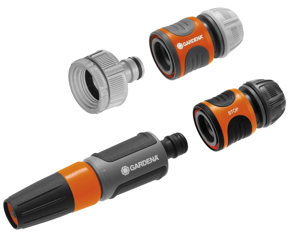 Neljä kastelusuutinta oranssina ja harmaana.