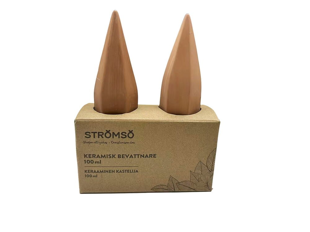 Kaksi terrakotta Strömsö keraamista kastelijaa, kartiomaiset, ruskeassa pahvilaatikossa.