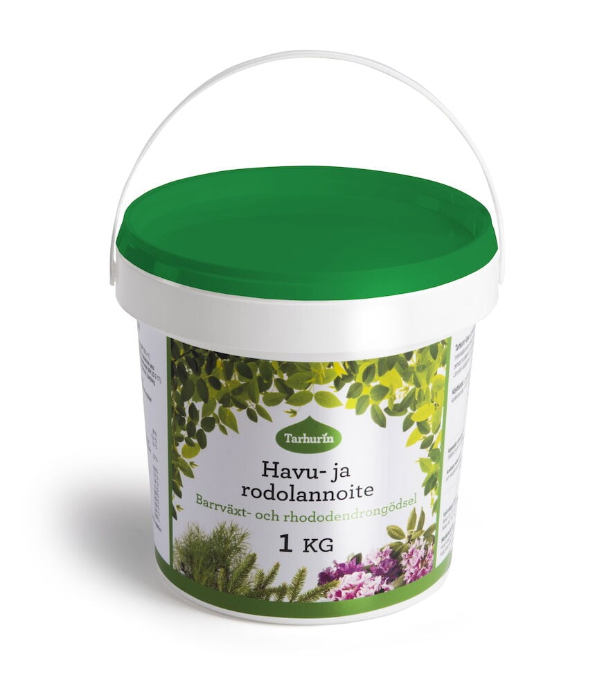 Valkoinen muovipurkki, jossa on vihreä kansi ja kantokahva.