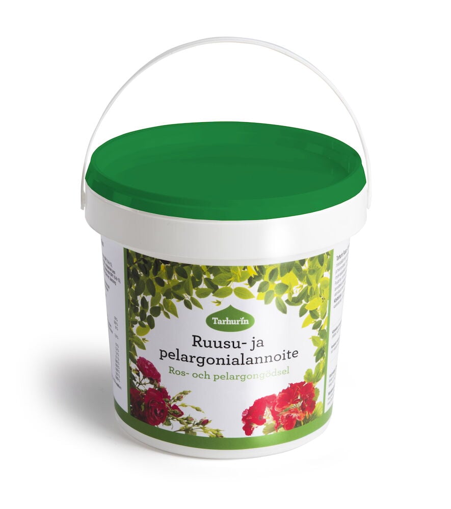 Valkoinen muovipurkki, jossa on vihreä kansi ja kukkatarra.