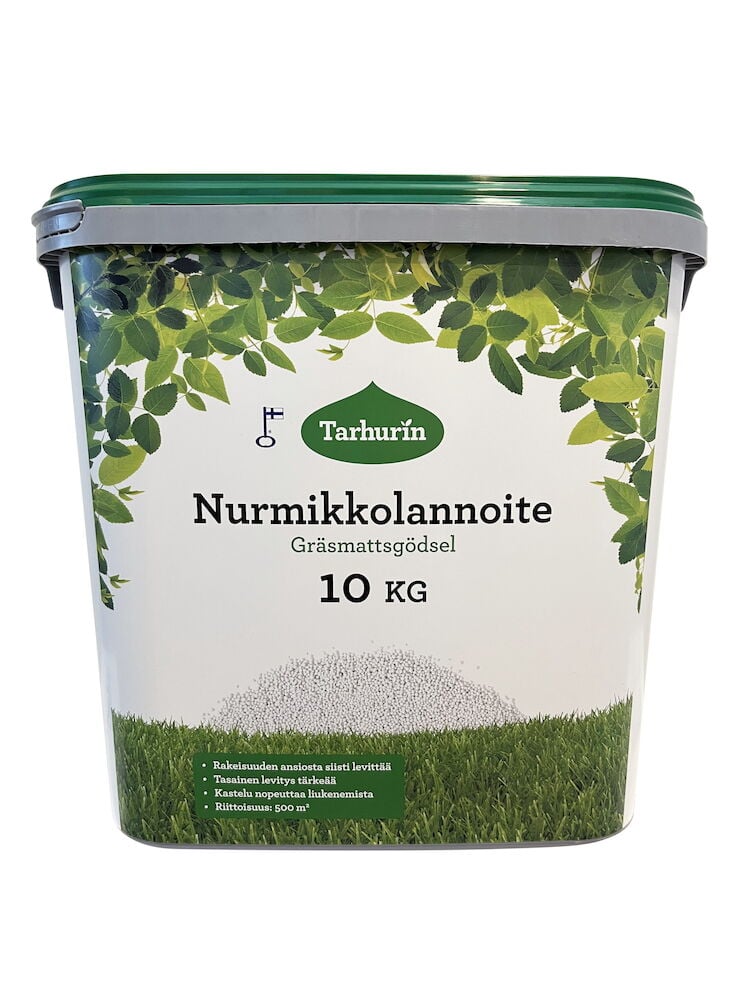 Valkoinen ämpäri, jossa on vihreä kansi nurmikon lannoitusta varten.