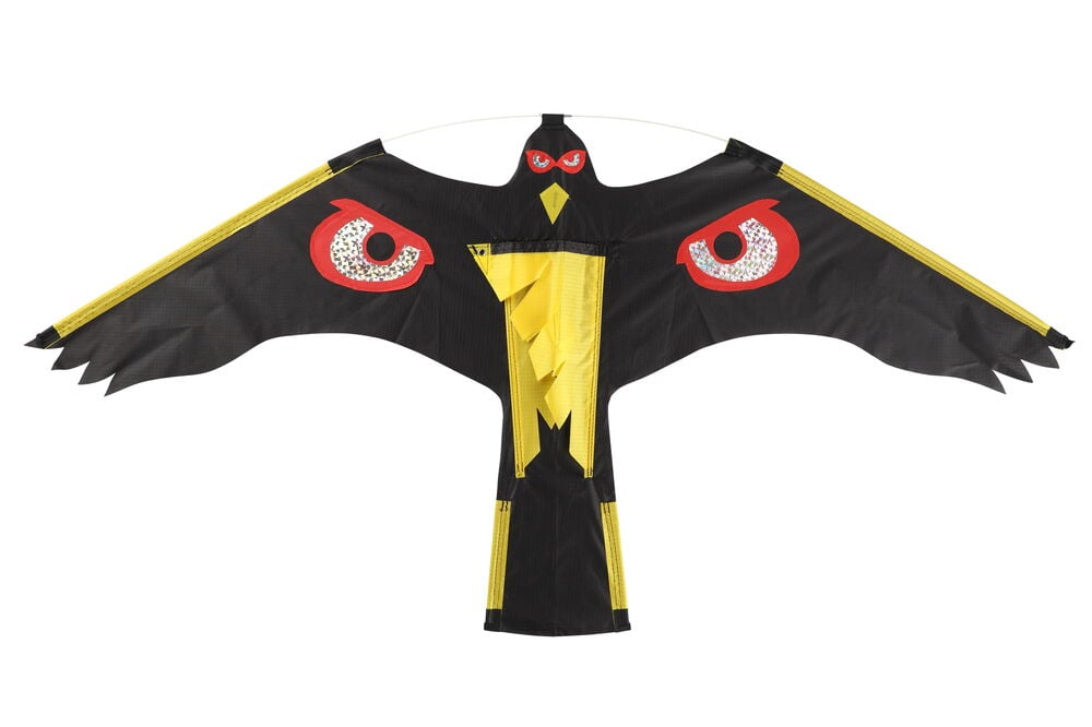 Musta ja keltainen linnunmuotoinen lohikäärme, jolla on punaiset silmät.