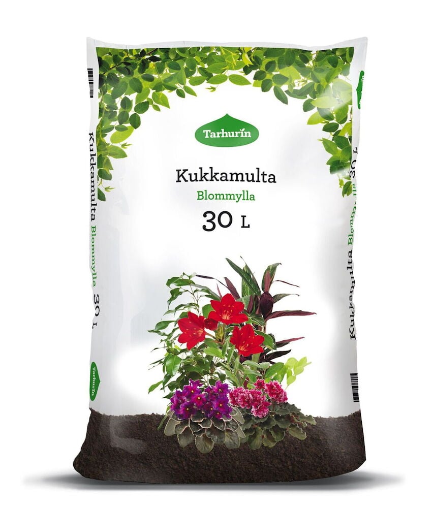 Valkoinen pussi, jossa kukkamultaa ja värikkäitä kukkia.