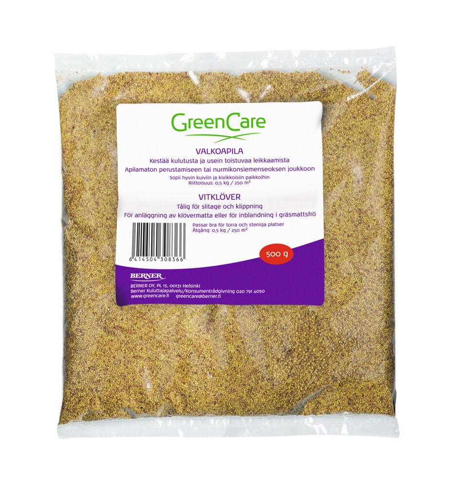 Läpinäkyvä muovipussi, jossa valkoapilansiemeniä ja etiketti.