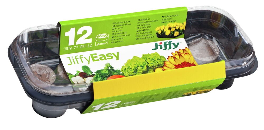 Mini kasvihuone, jossa on kaksitoista turvepellettia sisäviljelyyn.