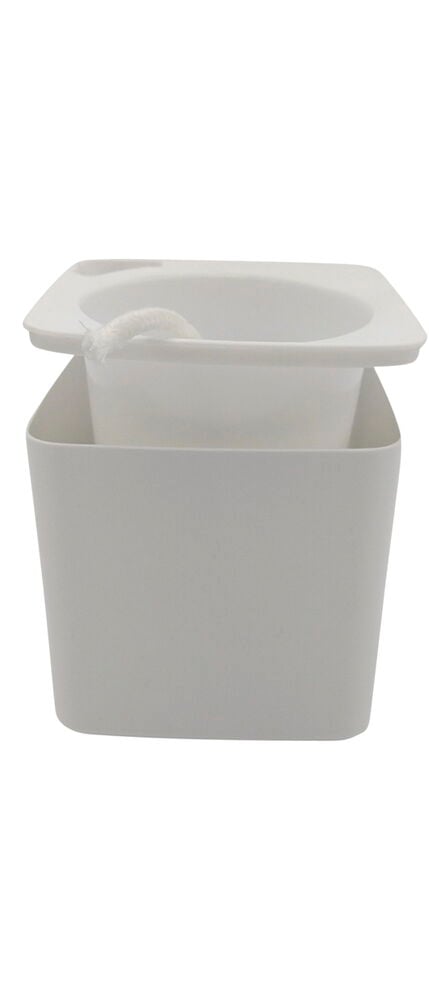 Valkoinen nelikulmainen ruukku, jossa on sisäosa ja sydänlanka.