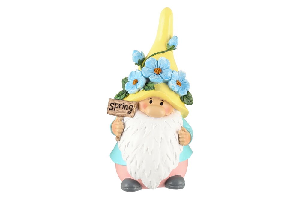 Värikäs kääpiöfiguuri kukkien ja kyltin kanssa, jossa lukee kevät.