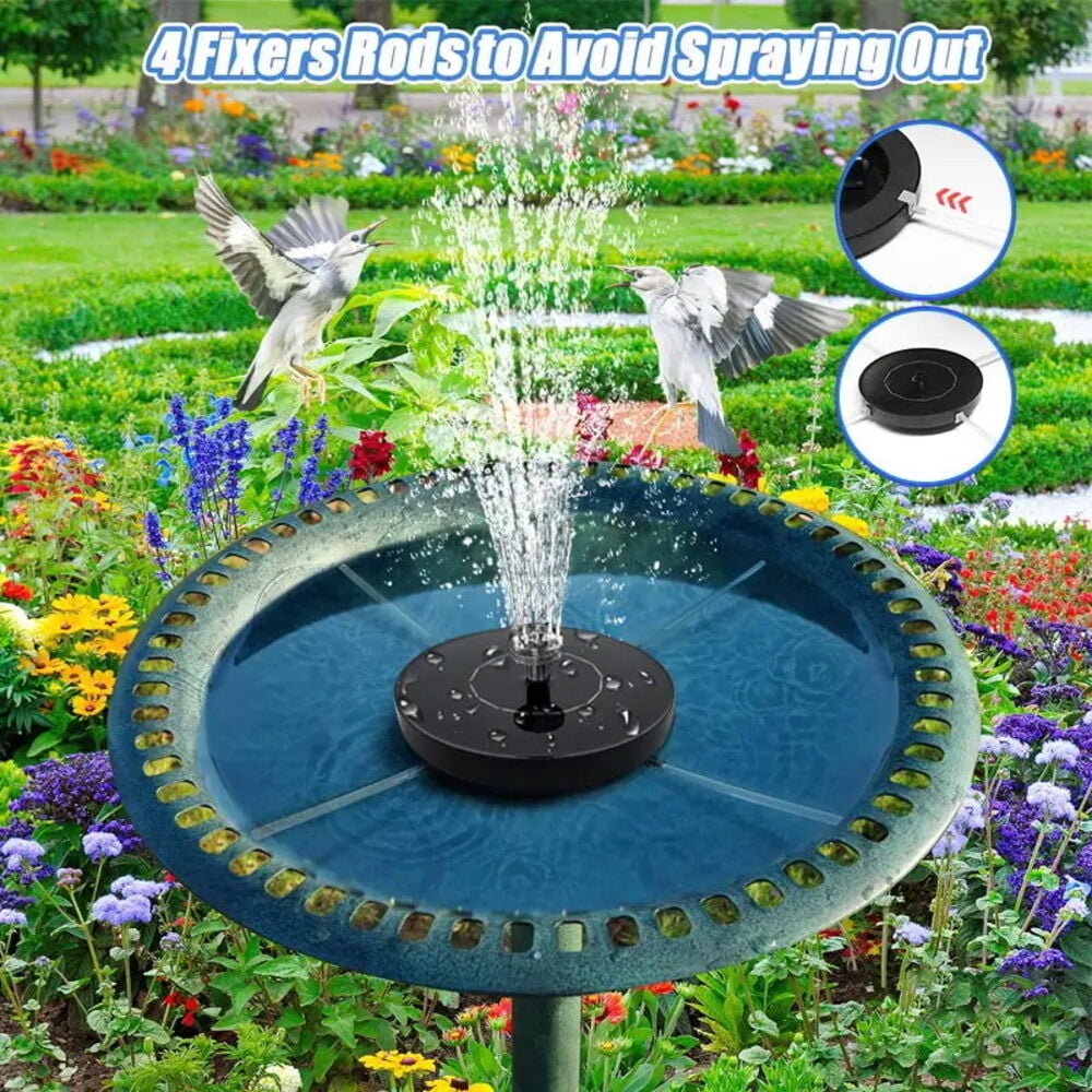 Musta Aurinkosuihkulähde Ogashi Kelluva sinisessä lintukylvyssä, vesi suihkuaa, kukkien ympäröimänä.