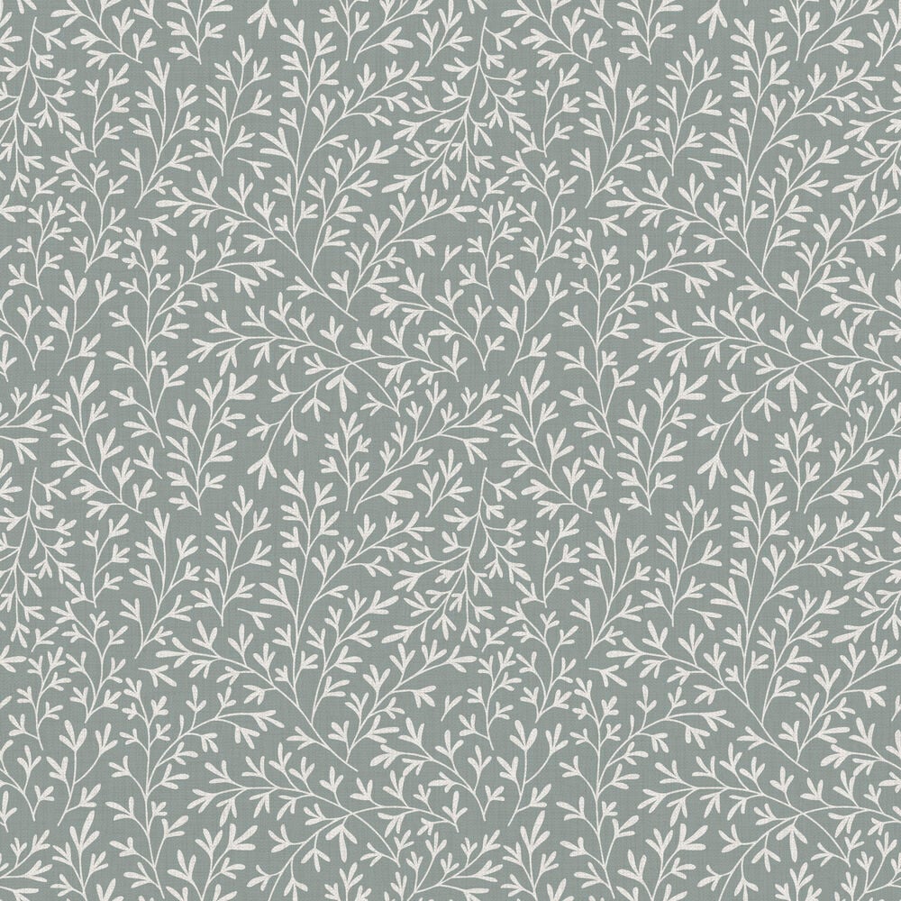 Grön tapet med vitt slingrande växtmönster.