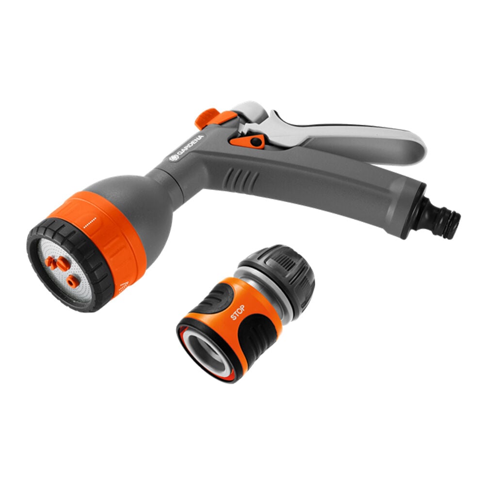 Harmaa ja oranssi pistoolisuutin letkuliitännällä.