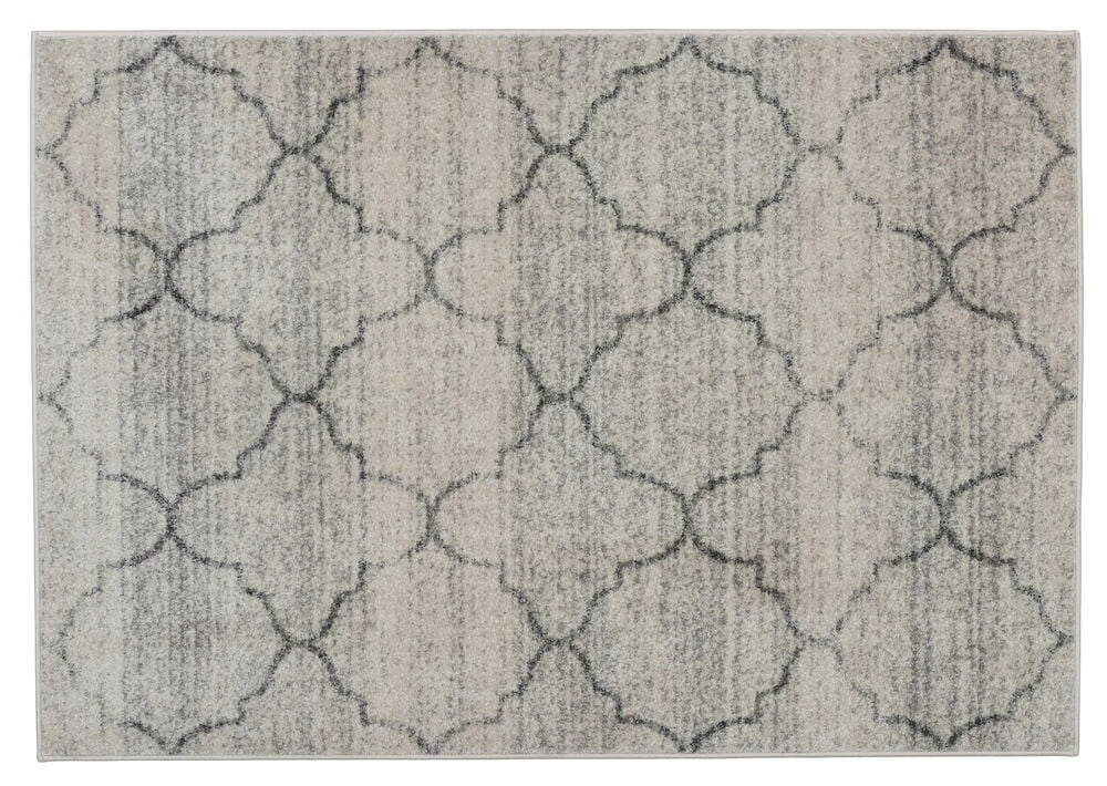 Beige matta med dekorativt medallionmönster.