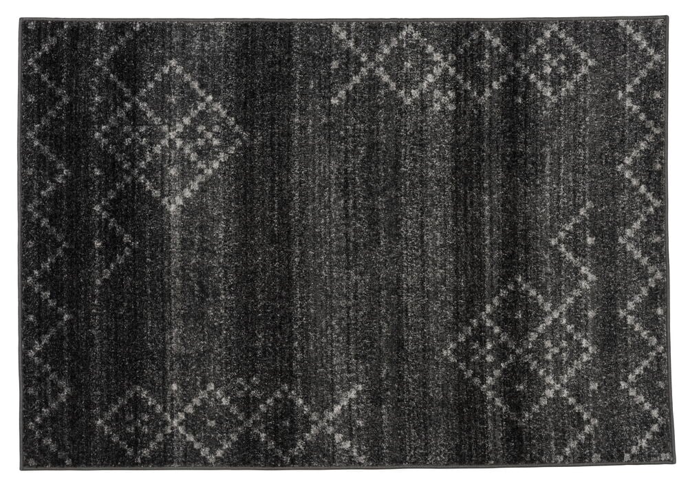 Dunkelgrauer Teppich mit geometrischem Muster.