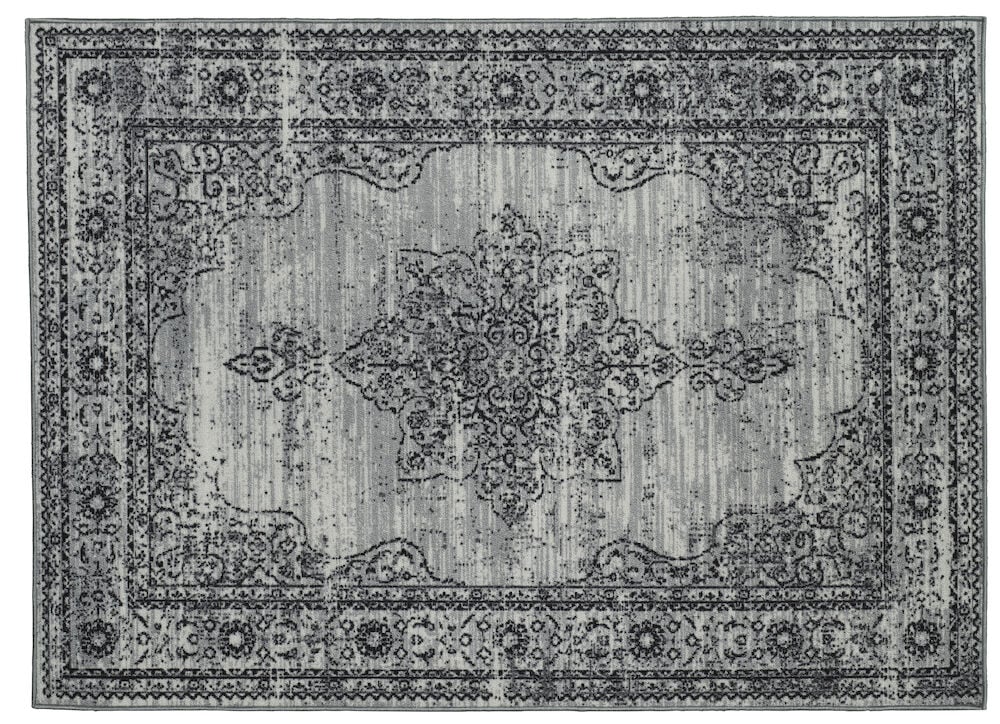 Harmaa matto, jossa on itämainen kuvio ja reunus.