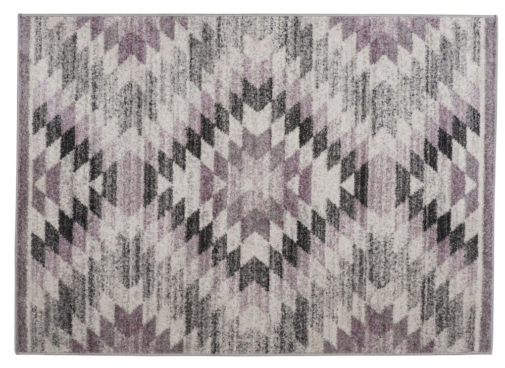 Gemusterter rosa Teppich mit geometrischem Zickzackmuster.