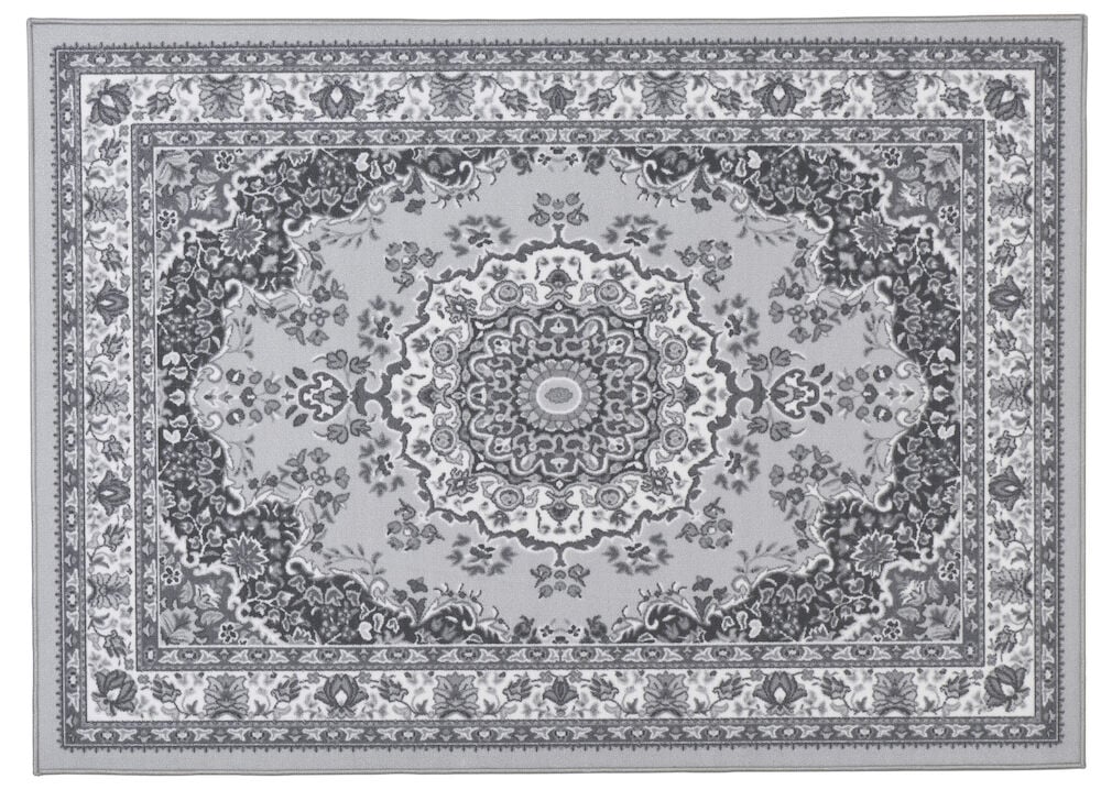 Suorakulmainen harmaa matto, jossa on itämaisesti inspiroitu kuvio.