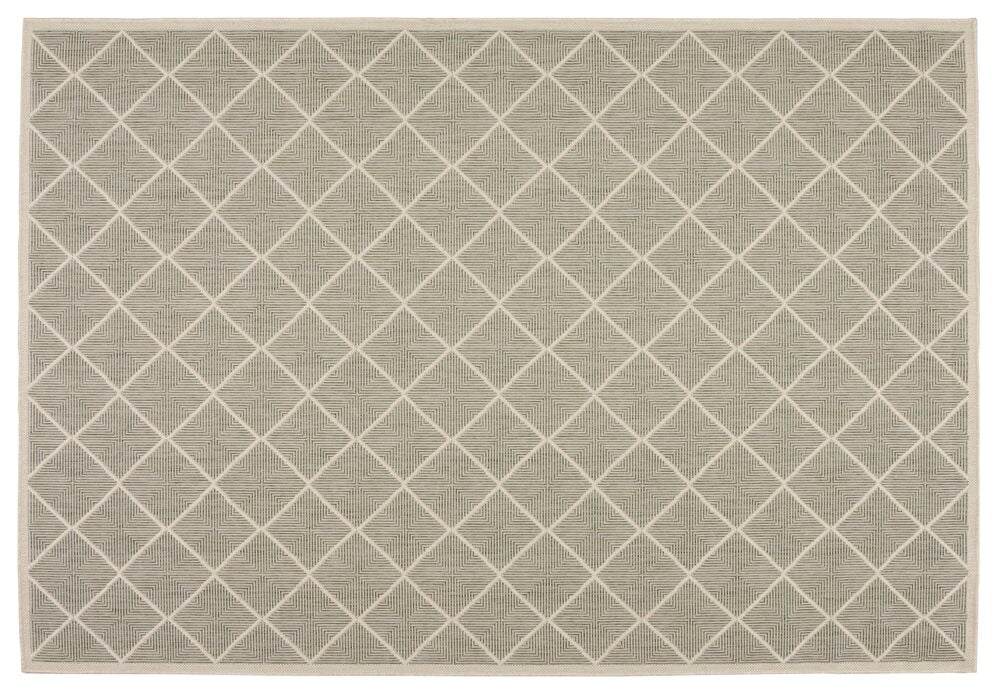 Grön rektangulär matta med vitt rutmönster.