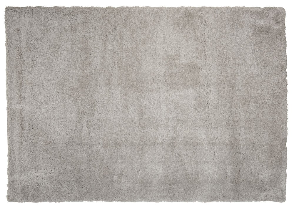 Suorakulmainen harmaa matto, jossa on pehmeä pinta.